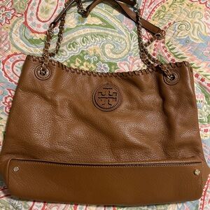 Dark tan leather and gold shoulder purse